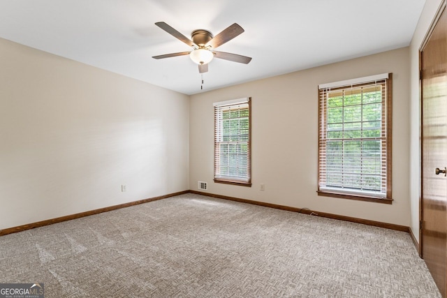 368 Henry Higgins Rd, Jackson, GA 30233 - spare room featuring healthy amount of natural light, ceiling fan, baseboards, and carpet flooring