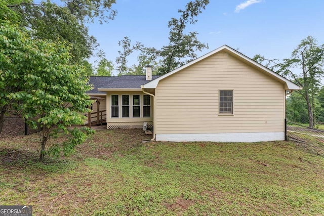 368 Henry Higgins Rd, Jackson, GA 30233 - rear view of house with a chimney and a shingled roof