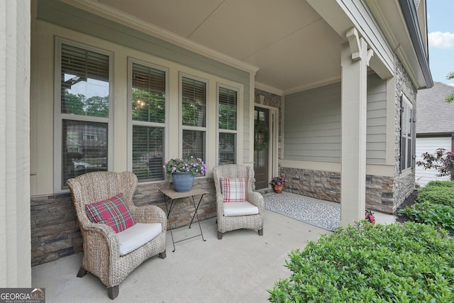 view of patio featuring a porch