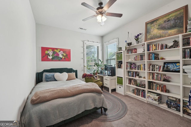 carpeted bedroom with ceiling fan