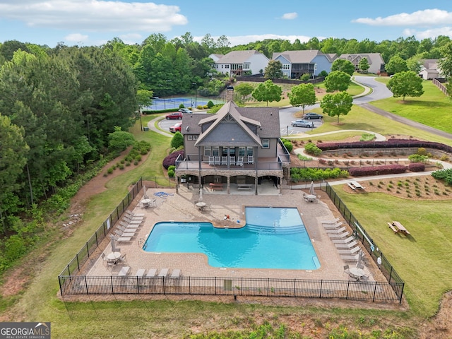 drone / aerial view of a pool