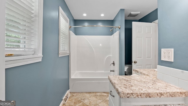 19 Fernwood Way NE, Rome, GA 30161 - bathroom with bathtub / shower combination, recessed lighting, and baseboards