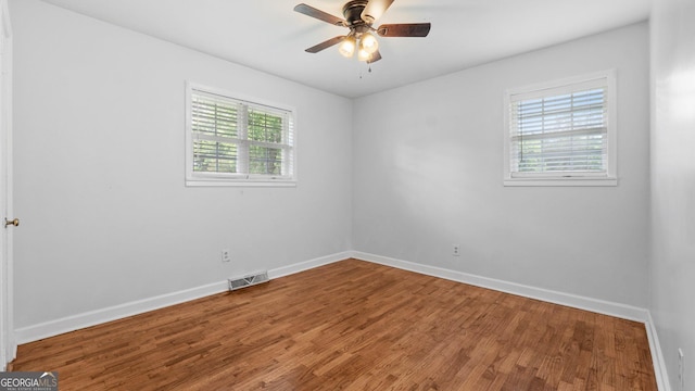 19 Fernwood Way NE, Rome, GA 30161 - empty room featuring baseboards, wood finished floors, and ceiling fan