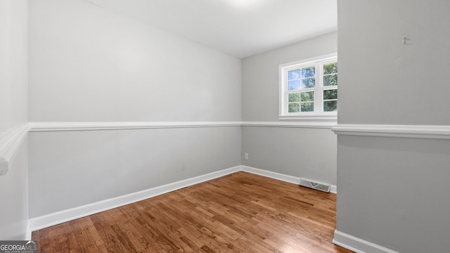 19 Fernwood Way NE, Rome, GA 30161 - empty room with wood finished floors and baseboards
