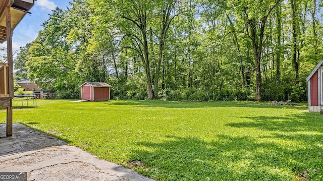 19 Fernwood Way NE, Rome, GA 30161 - view of grassy yard with a shed and an outdoor structure