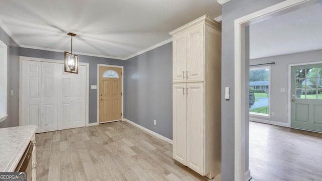 19 Fernwood Way NE, Rome, GA 30161 - entryway with light wood-type flooring, baseboards, and crown molding