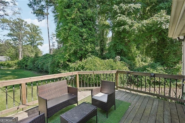 deck featuring a lawn
