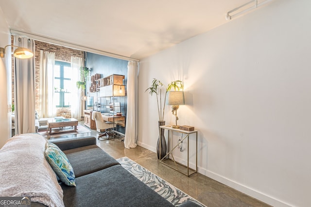 170 Boulevard Se 521H, Atlanta, GA 30312 - living room featuring baseboards and a desk