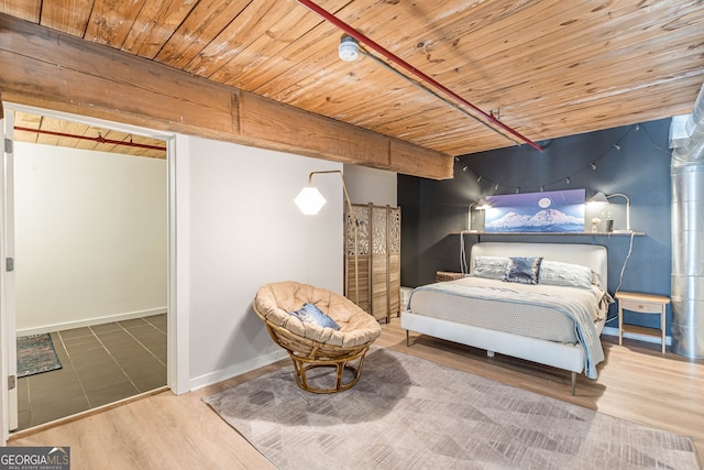 170 Boulevard Se 521H, Atlanta, GA 30312 - bedroom featuring wood finished floors, wood ceiling, and baseboards