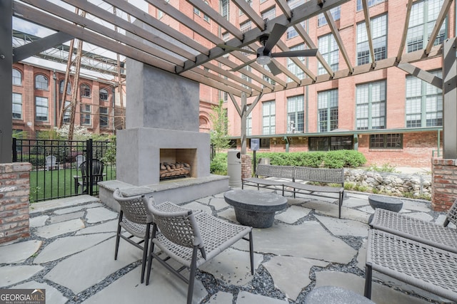 170 Boulevard Se 521H, Atlanta, GA 30312 - view of patio with a pergola, a ceiling fan, and an outdoor living space with a fireplace