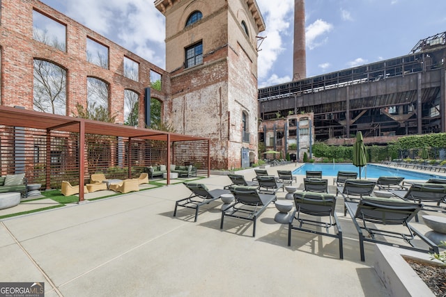 170 Boulevard Se 521H, Atlanta, GA 30312 - view of patio featuring an outdoor hangout area and a community pool