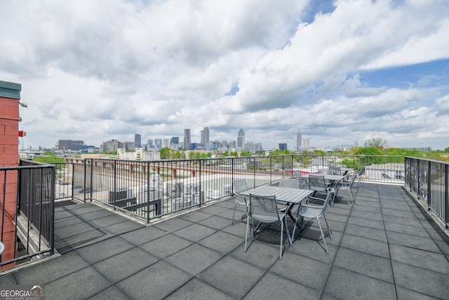 170 Boulevard Se 521H, Atlanta, GA 30312 - view of patio featuring a skyline view and outdoor dining area