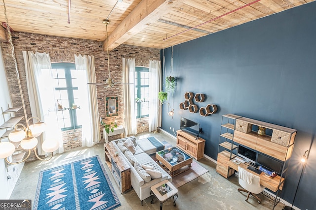 170 Boulevard Se 521H, Atlanta, GA 30312 - living area with wooden ceiling with exposed beams, concrete flooring, and baseboards