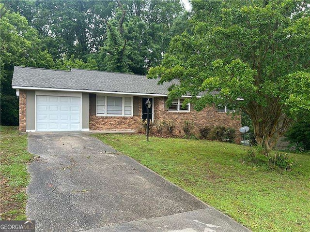 5703 Kimberly Ln, Norcross, GA 30071 - ranch-style home with an attached garage, brick siding, driveway, and a front yard
