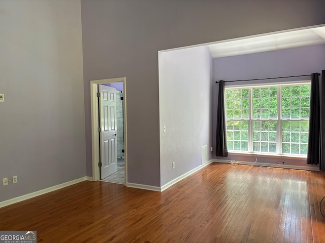 2828 Hicks Rd SW, Marietta, GA 30060 - spare room featuring baseboards and wood-type flooring