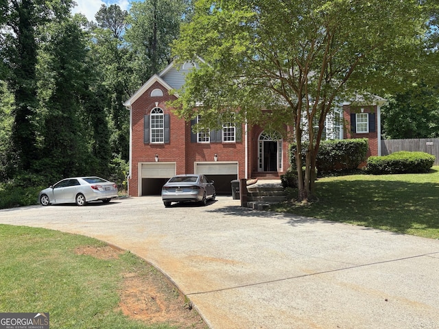 2828 Hicks Rd SW, Marietta, GA 30060 - view of front of property with an attached garage, concrete driveway, and brick siding