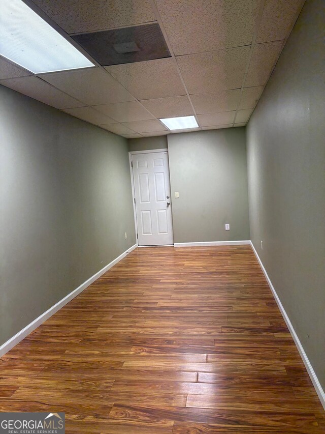 2828 Hicks Rd SW, Marietta, GA 30060 - finished basement with wood finished floors, a drop ceiling, and baseboards