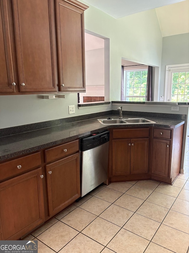 2828 Hicks Rd SW, Marietta, GA 30060 - kitchen featuring dishwasher, a sink, light tile patterned floors, a peninsula, and lofted ceiling