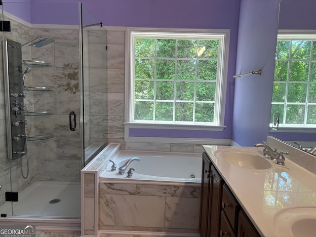2828 Hicks Rd SW, Marietta, GA 30060 - bathroom featuring plenty of natural light, a shower stall, a bath, and double vanity