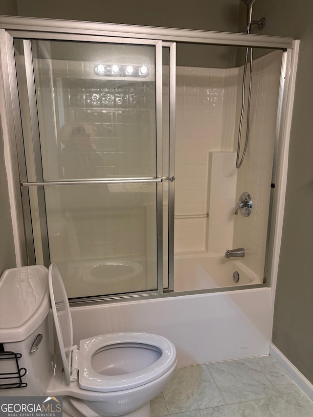 2828 Hicks Rd SW, Marietta, GA 30060 - full bathroom with toilet, enclosed tub / shower combo, and baseboards