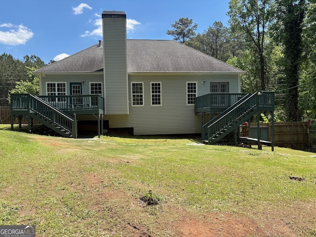 2828 Hicks Rd SW, Marietta, GA 30060 - back of house featuring stairs, a deck, and a chimney