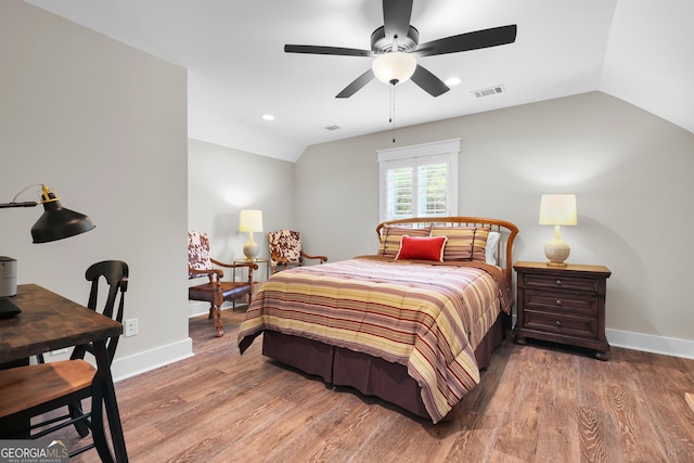 bedroom featuring lofted ceiling, baseboards, wood finished floors, ceiling fan, and recessed lighting