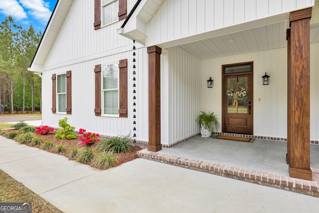 doorway to property with a porch