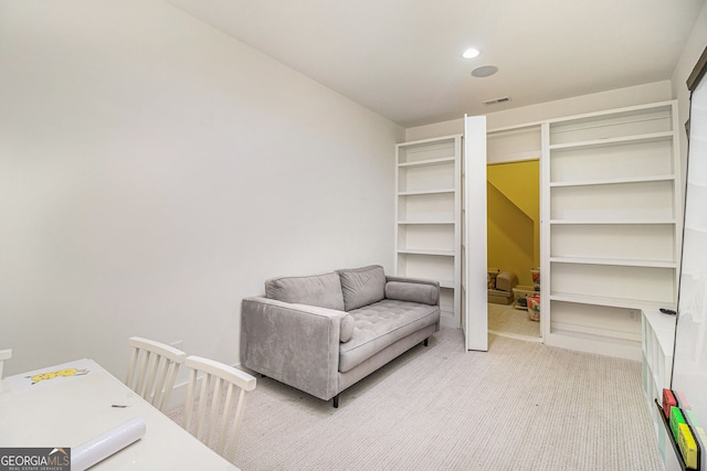 sitting room with light carpet
