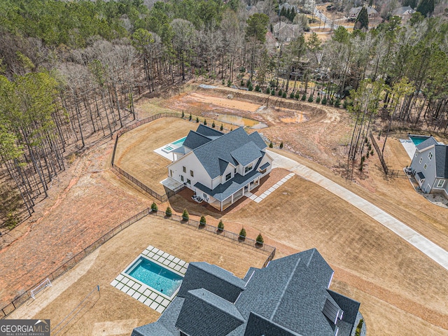 view from above of property featuring a pool