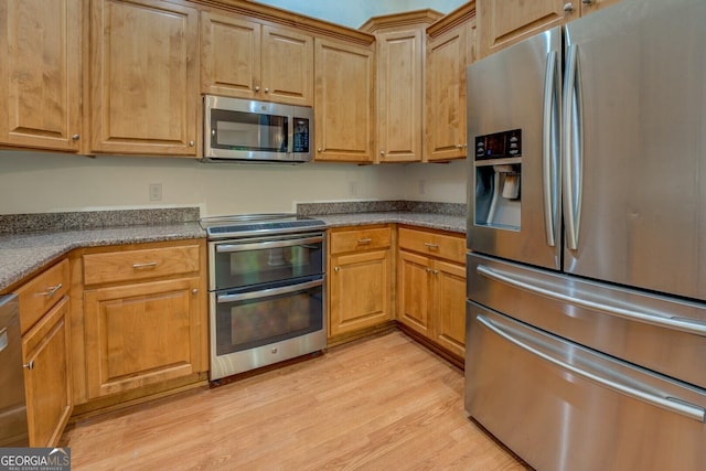 349 Bowen Hill Rd, Haddock, GA 31033 - kitchen with stainless steel appliances and light wood-style flooring