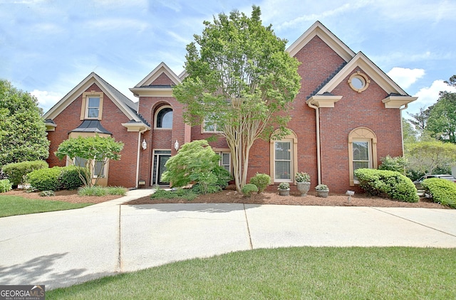 traditional home with brick siding