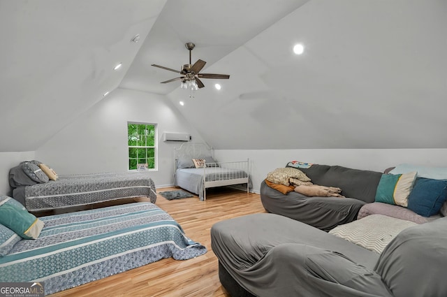 bedroom with wood finished floors, vaulted ceiling, a ceiling fan, and recessed lighting