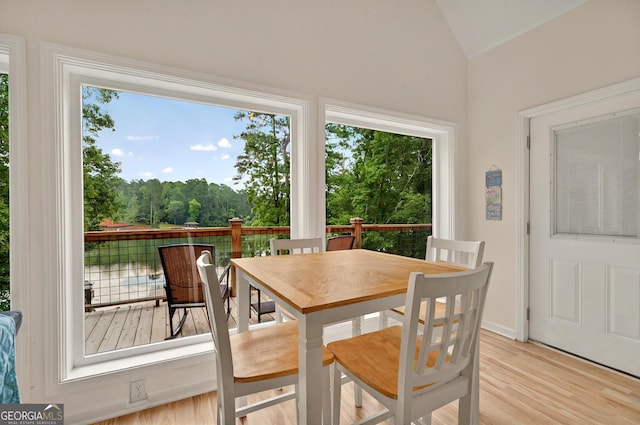sunroom / solarium with vaulted ceiling