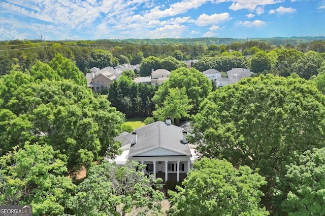 drone / aerial view of a heavily wooded area