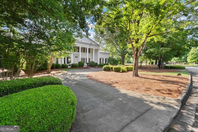 3818 Sweet Bottom Dr, Duluth, GA 30096 - neoclassical home featuring curved driveway