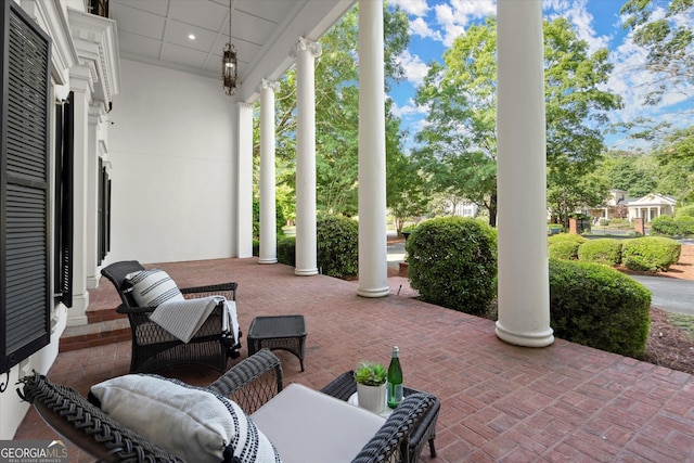 view of patio featuring a porch