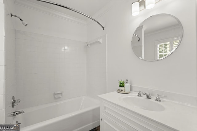 bathroom featuring crown molding, shower / washtub combination, and vanity