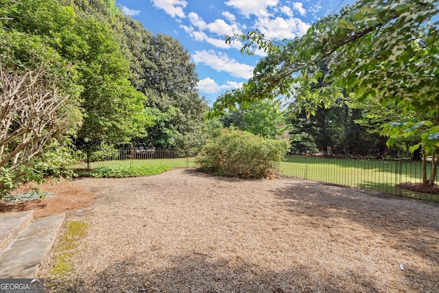 view of yard with fence