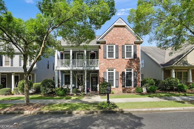 655 Grove Manor Ct, Suwanee, GA 30024 - view of front of property featuring brick siding and a balcony