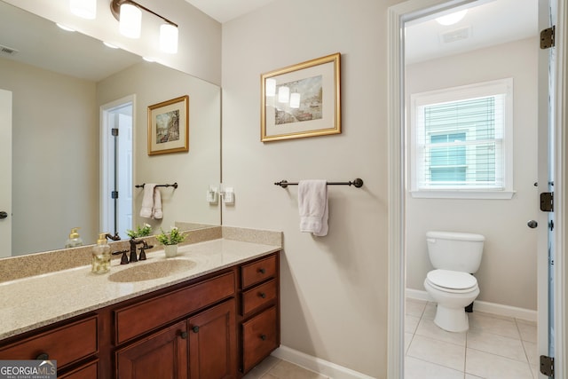 655 Grove Manor Ct, Suwanee, GA 30024 - bathroom with vanity and tile patterned flooring