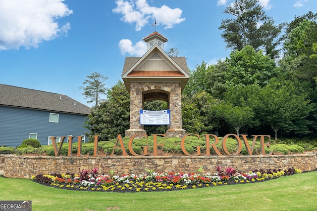 655 Grove Manor Ct, Suwanee, GA 30024 - community / neighborhood sign featuring a lawn