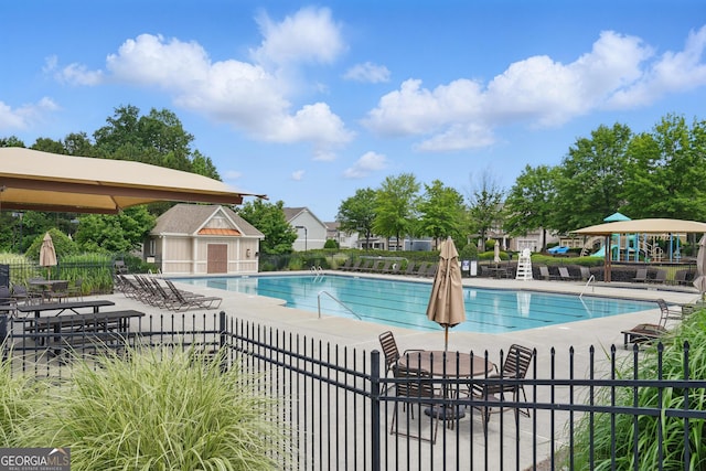 655 Grove Manor Ct, Suwanee, GA 30024 - community pool with a patio