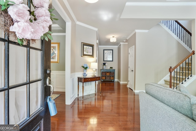 655 Grove Manor Ct, Suwanee, GA 30024 - entrance foyer featuring stairs, wood finished floors, and crown molding