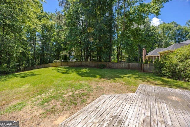 view of yard featuring a deck