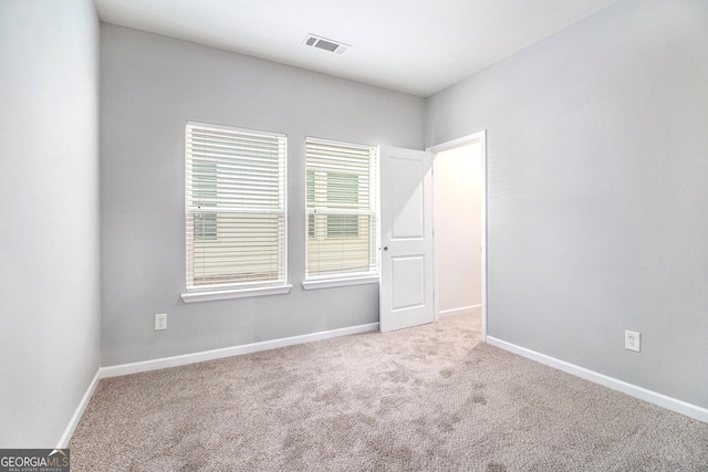2769 Morgan Spring Trl, Buford, GA 30519 - spare room featuring carpet and baseboards