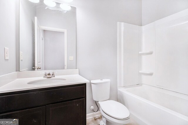2769 Morgan Spring Trl, Buford, GA 30519 - bathroom featuring toilet, vanity, baseboards, and shower / tub combination