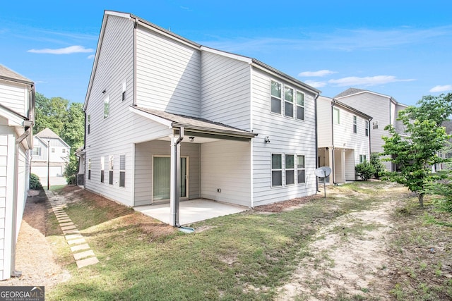 2769 Morgan Spring Trl, Buford, GA 30519 - rear view of property featuring a patio area and a yard
