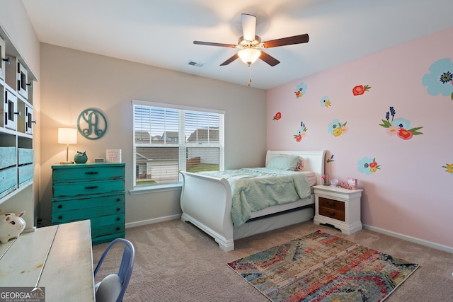 bedroom with carpet flooring, baseboards, and ceiling fan