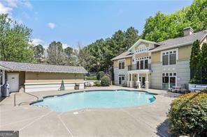 2700 Pine Tree Rd NE Unit 2204, Atlanta, GA 30324 - swimming pool featuring a patio area