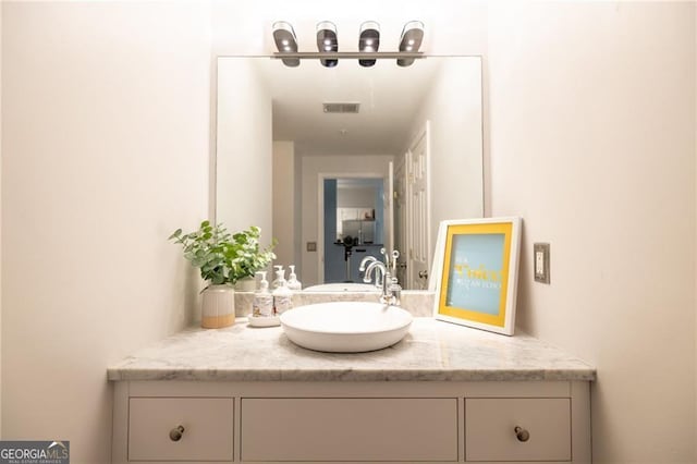 2700 Pine Tree Rd NE Unit 2204, Atlanta, GA 30324 - bathroom featuring vanity
